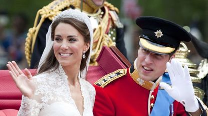 Kate and WIlliam wave to the crowd on their wedding day.