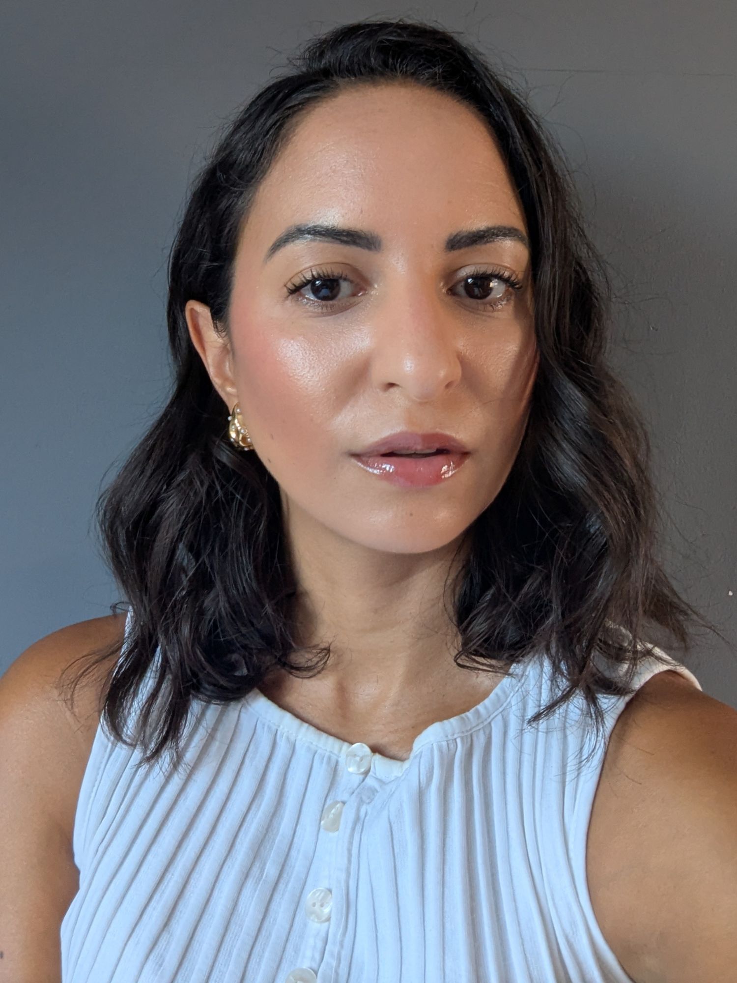 Jazzria Harris wearing Laura Mercier Real Flawless Foundation, one of the best blurring foundations
