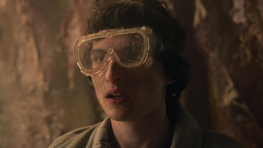 Mike covered in dirt wearing goggles in tunnel in Stranger Things 5 Episode 4