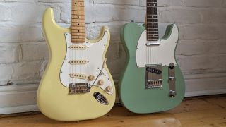 A Fender Player II Stratocaster & Telecaster leaning against a white brick wall