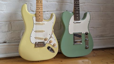 A Fender Player II Stratocaster &amp; Telecaster leaning against a white brick wall