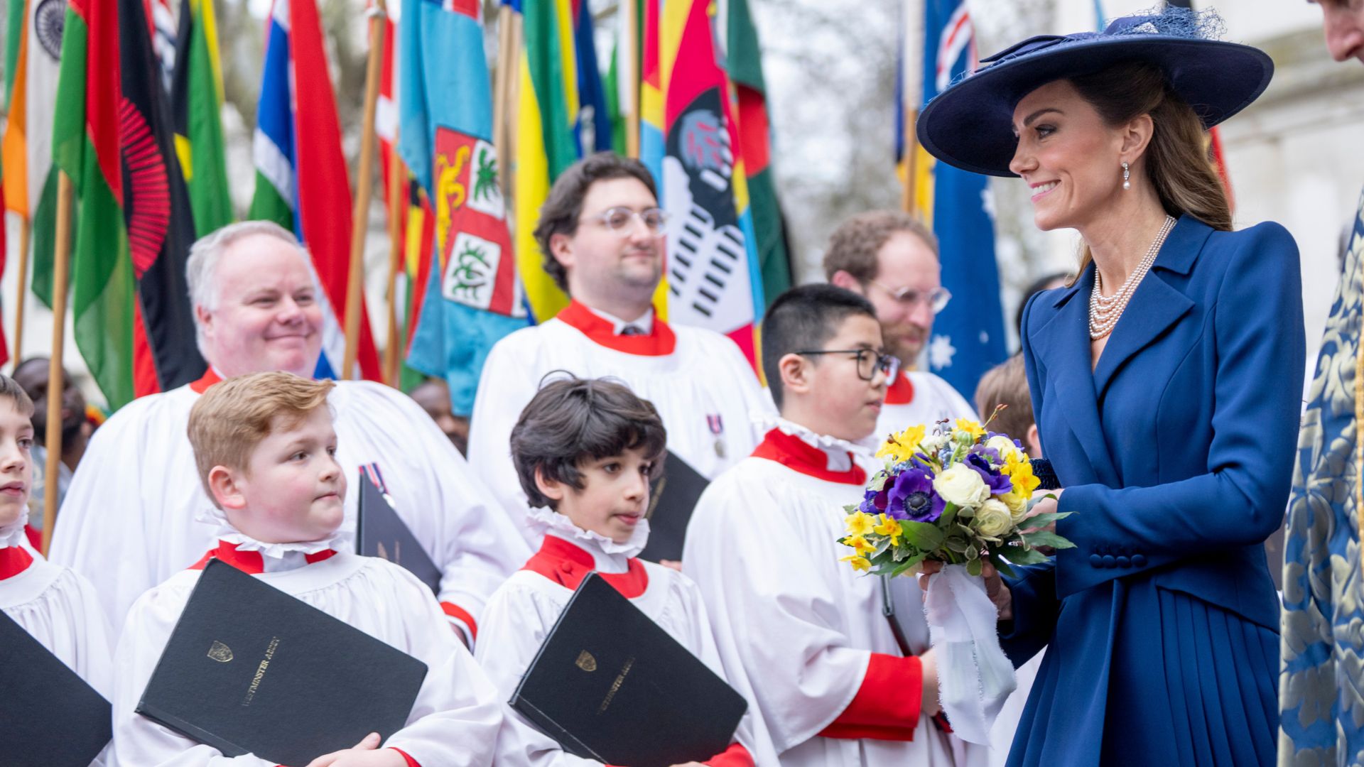 Kate Middleton greets choir singers at Westminster Abbey