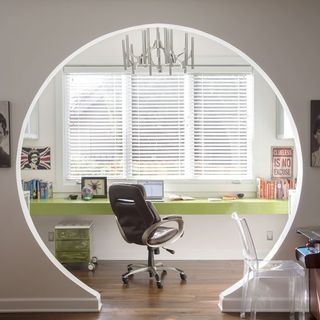 study room with zingy lime desk and circular entrance