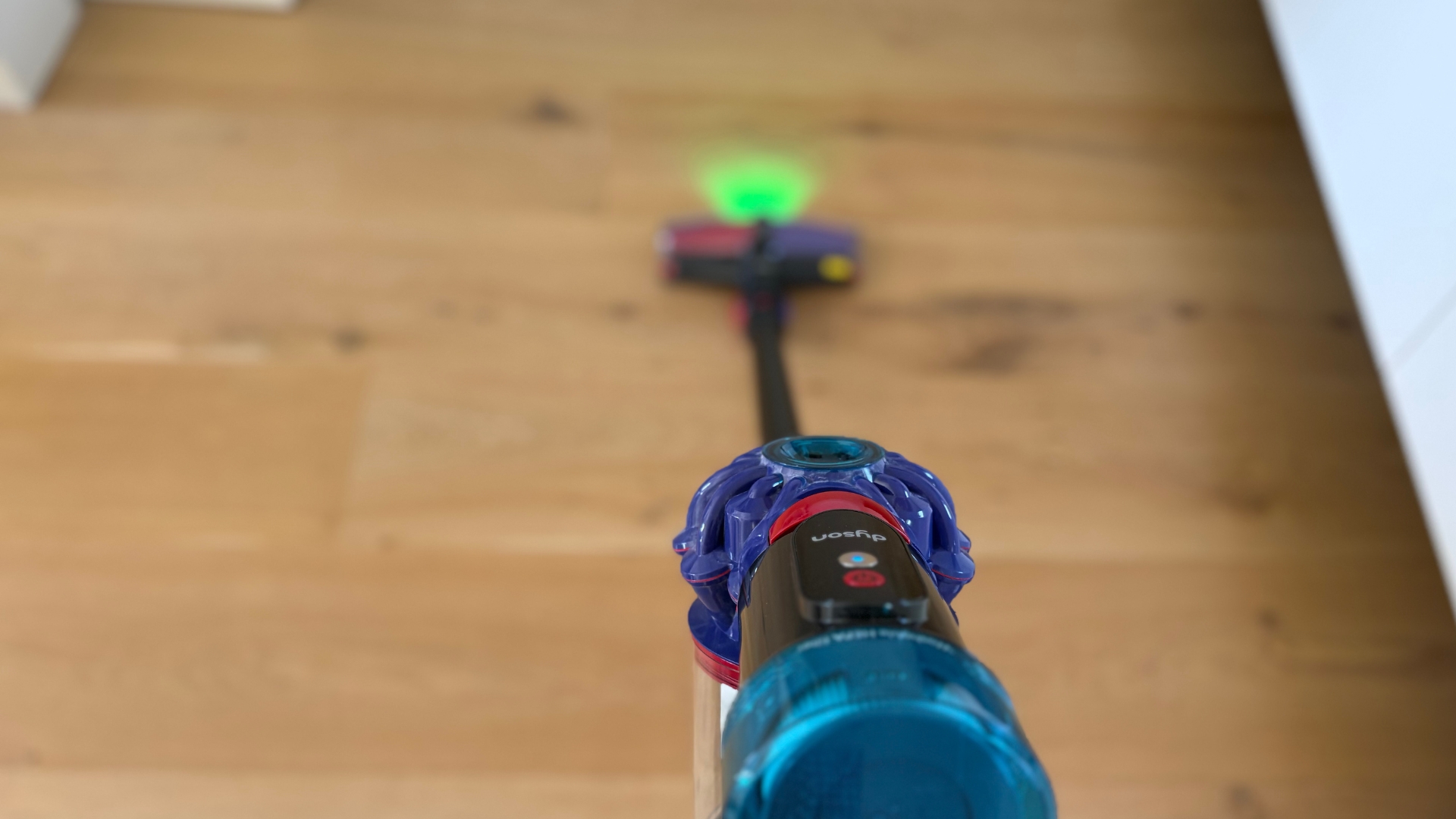 Testing the Dyson V10 Konical Cordless Vacuum showing it vacuuming the floor