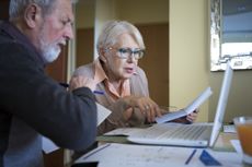 couple looking at their investments