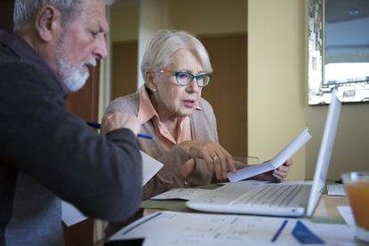 couple looking at their investments