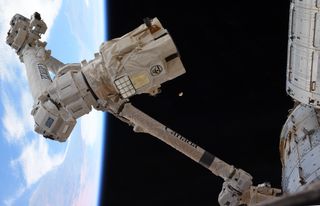 The last quarter moon looms behind the International Space Station's Canadarm2 robotic arm in this photo by NASA astronaut Jessica Meir. She and her Expedition 62 crewmate Andrew Morgan used Canadarm2 to grapple an arriving Cygnus cargo spacecraft on Tuesday (Feb. 18). "The mighty @csa_asc #Canadarm2 ready to grapple, as @AstroDrewMorgan & I practiced our maneuvers to capture #Cygnus that is headed our way, loaded with nearly 7,500 pounds of science, cargo, and @Space_Station supplies," Meir tweeted on Saturday (Feb. 15). "Even the Moon made an appearance, awaiting #ARTEMIS eagerly," she added, referring to NASA's Artemis program, which aims to land astronauts on the moon in 2024.