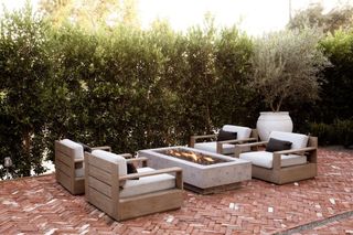 A backyard seating area with firepit
