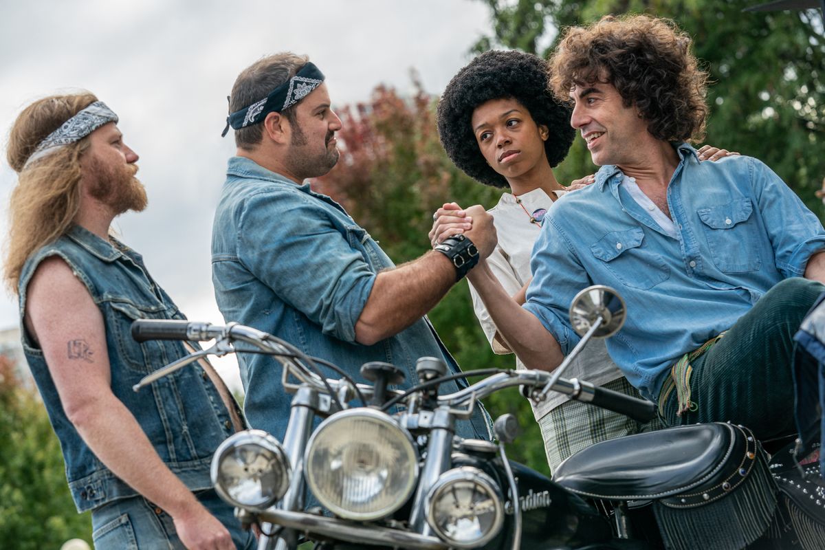 Sacha Baron Cohen as Abbie Hoffman in The Trial of the Chicago 7.