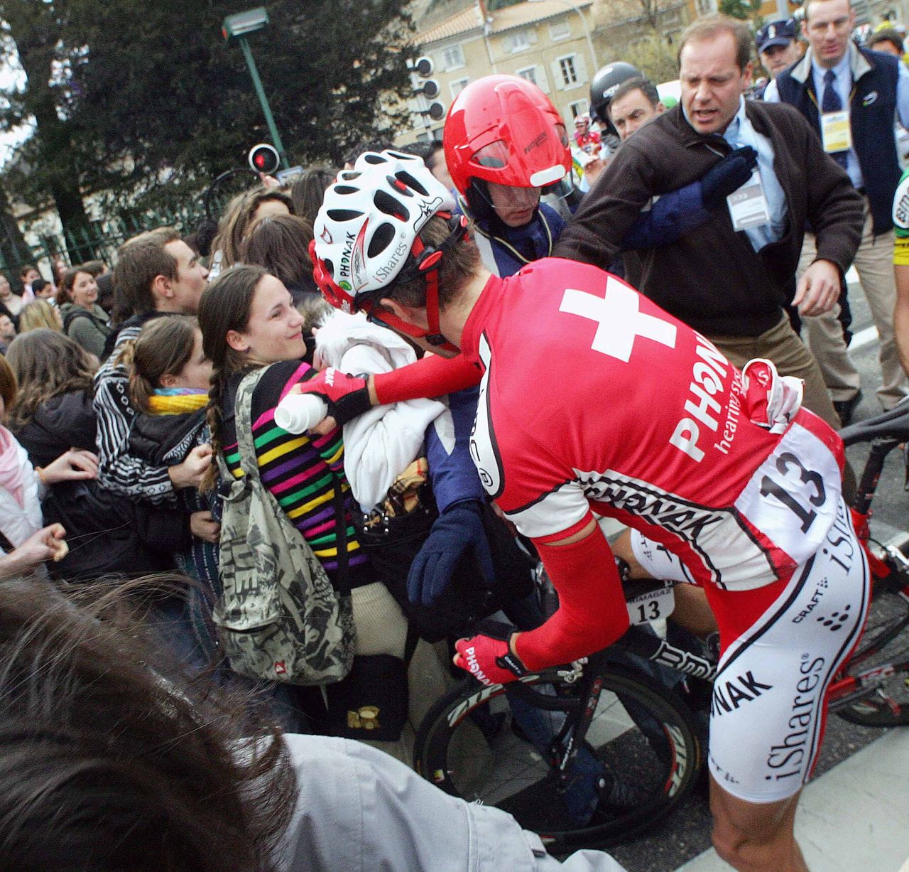 Christian Prudhomme helps Martin Elmiger and the Paris-Nice peloton find a path through a student protest on the road to Rasteau in 2006.