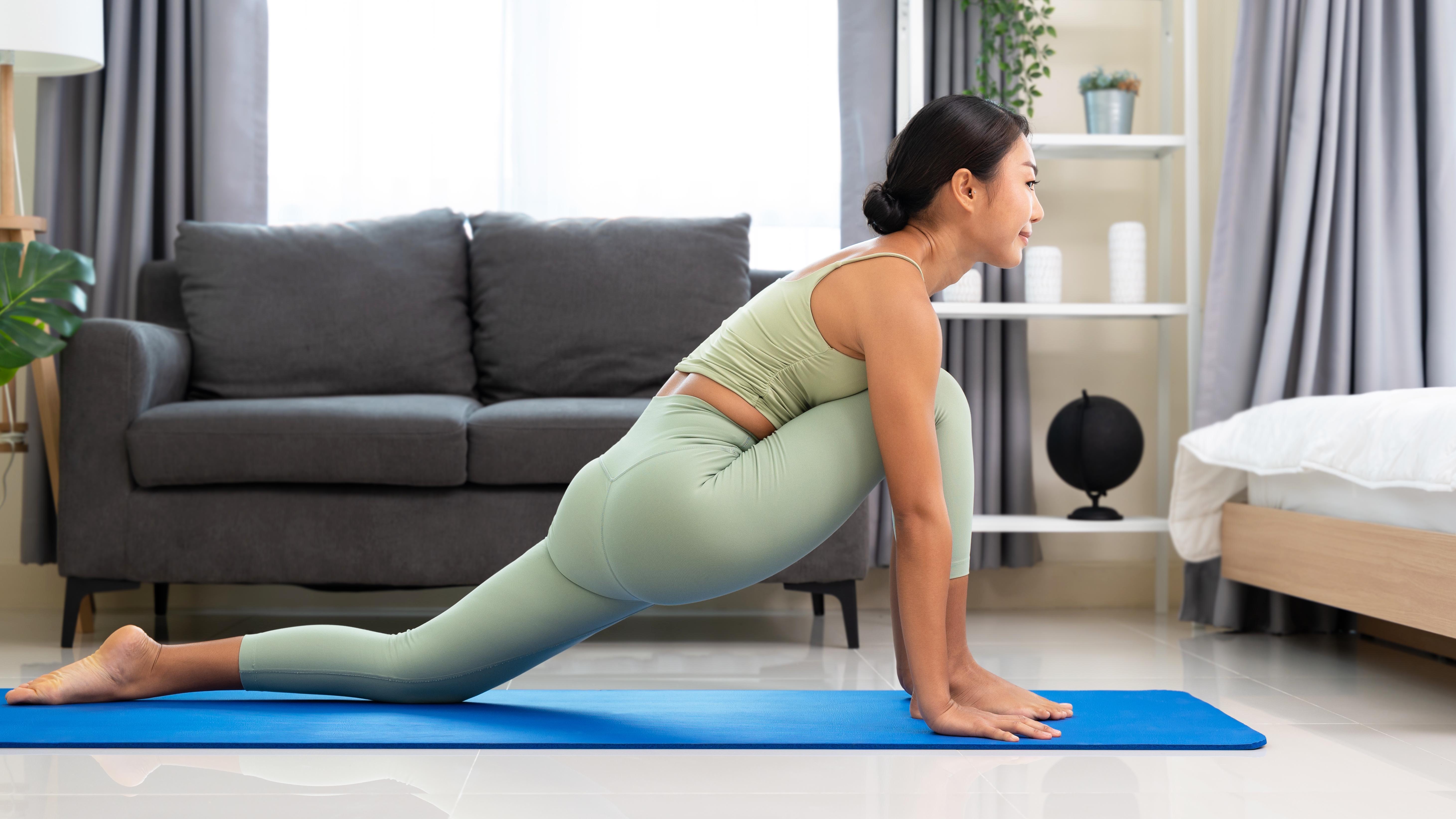 a woman doing the lizard lunge