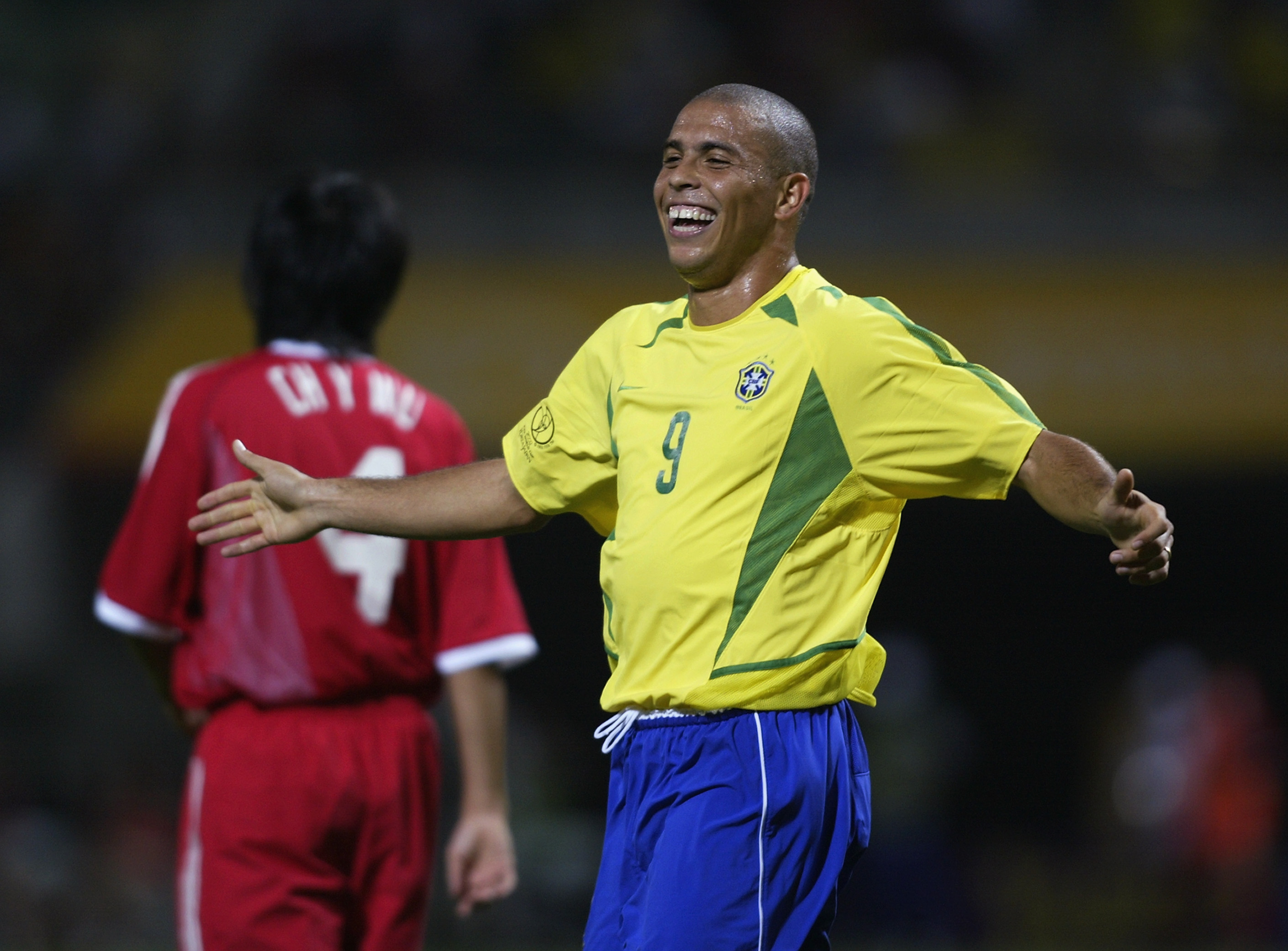 Ronaldo celebrates after scoring for Brazil against China at the 2002 World Cup.