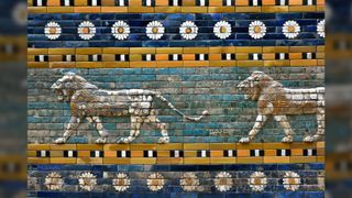 Detail from the Processional Way in Babylon. Glazed enamel bricks with a lion motif and also some white daisies.