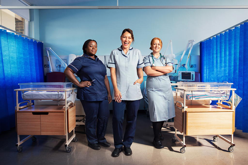 Emma on the wards with co-workers Corinne and Molly.