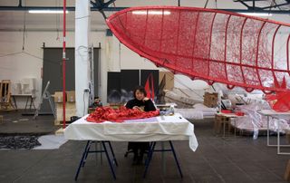 Portrait of Chiharu Shiota inside her Berlin studio, photographed by Sunhi Mang
