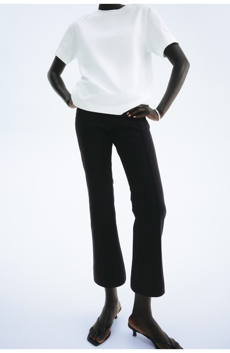 flared crease-front trousers