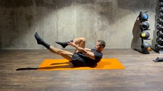 Matt Kendrick demonstrates how to do single leg Pilates stretch