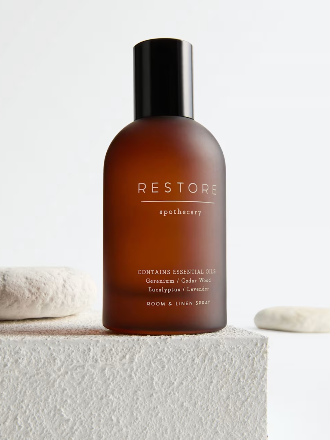 An amber glass restore room spray from M&amp;amp;S