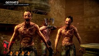 In-game screenshot of zombies surrounding the player in The House of the Dead 2 Remake.