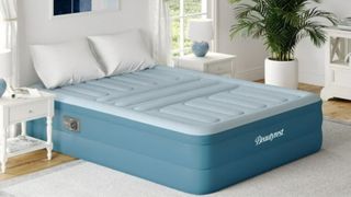 Beautyrest air mattress placed on the floor in a light, bright bedroom