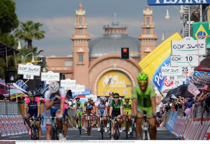 The peloton rolls over the line in Bari