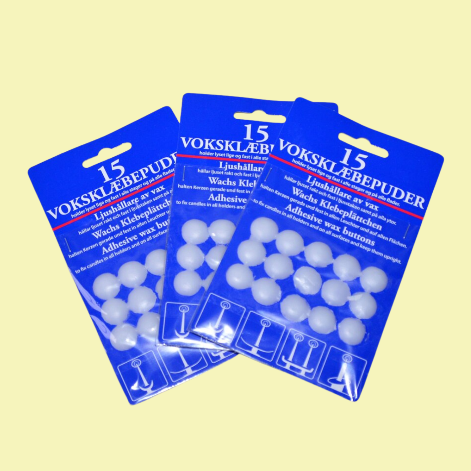 A pack of three candle wax dots