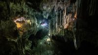 Diver in underwater cave.