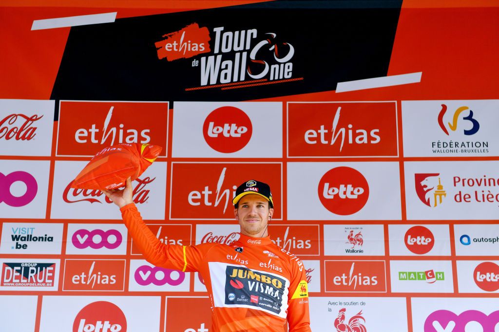 HEUSDENZOLDER BELGIUM JULY 21 Dylan Groenewegen of Netherlands and Team Jumbo Visma Orange Leader Jersey celebrates at podium during the 42nd Tour de Wallonie 2021 Stage 2 a 120km stage from Zolder Circuit to Zolder Circuit Race held at the Zolder Circuit due to flooding in the country tourdewallonie grandprixdewallonie on July 21 2021 in HeusdenZolder Belgium Photo by Luc ClaessenGetty Images