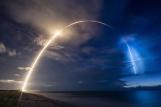 A SpaceX Falcon 9 rocket streaks into space in this dazzling view of the Starlink 8 launch that sent 58 Starlink satellites and three Planet SkySats into orbit before dawn from Cape Canaveral Air Force Station in Florida on June 13, 2020.