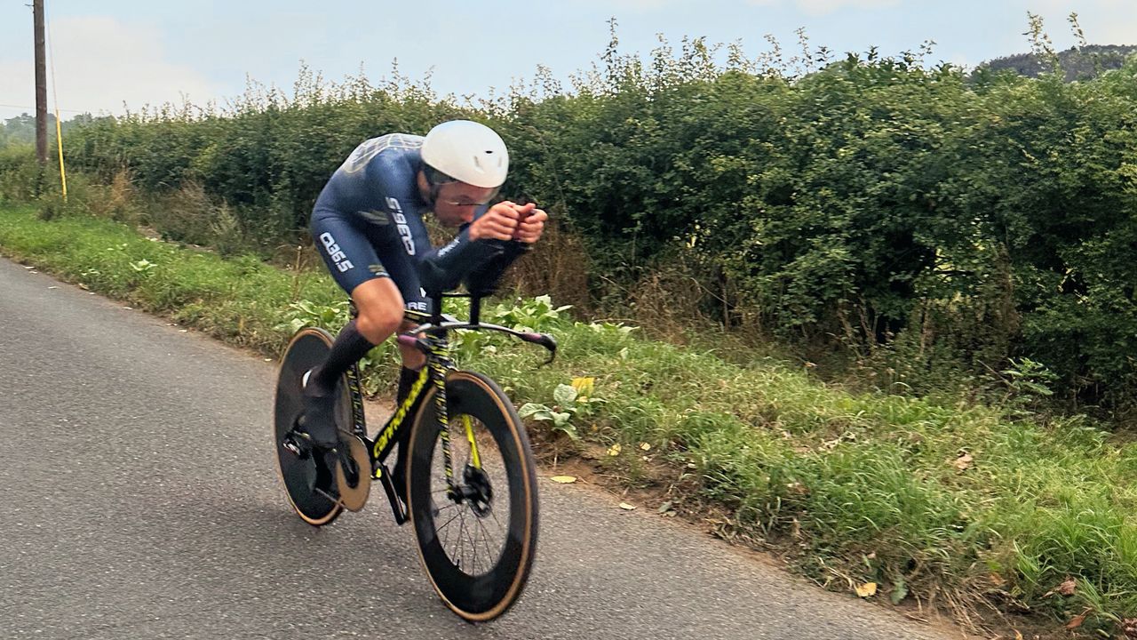 Action shot of author Aaron Borrill riding one of the best time trial helmets in a time trial race