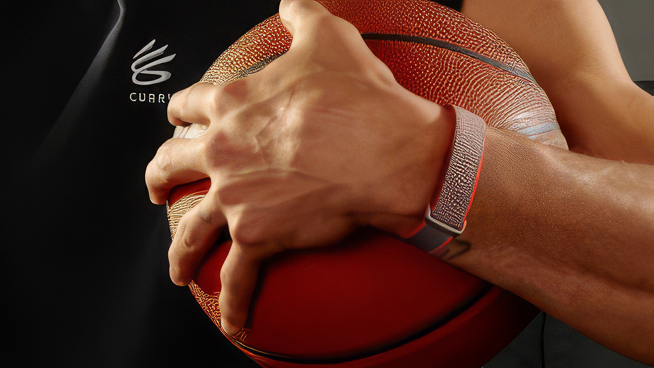 Steph Curry wearing a new Fitbit band