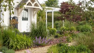 A landscaped garden with borders edged in corton steel