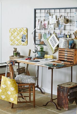 Craft room desk with inspiration board