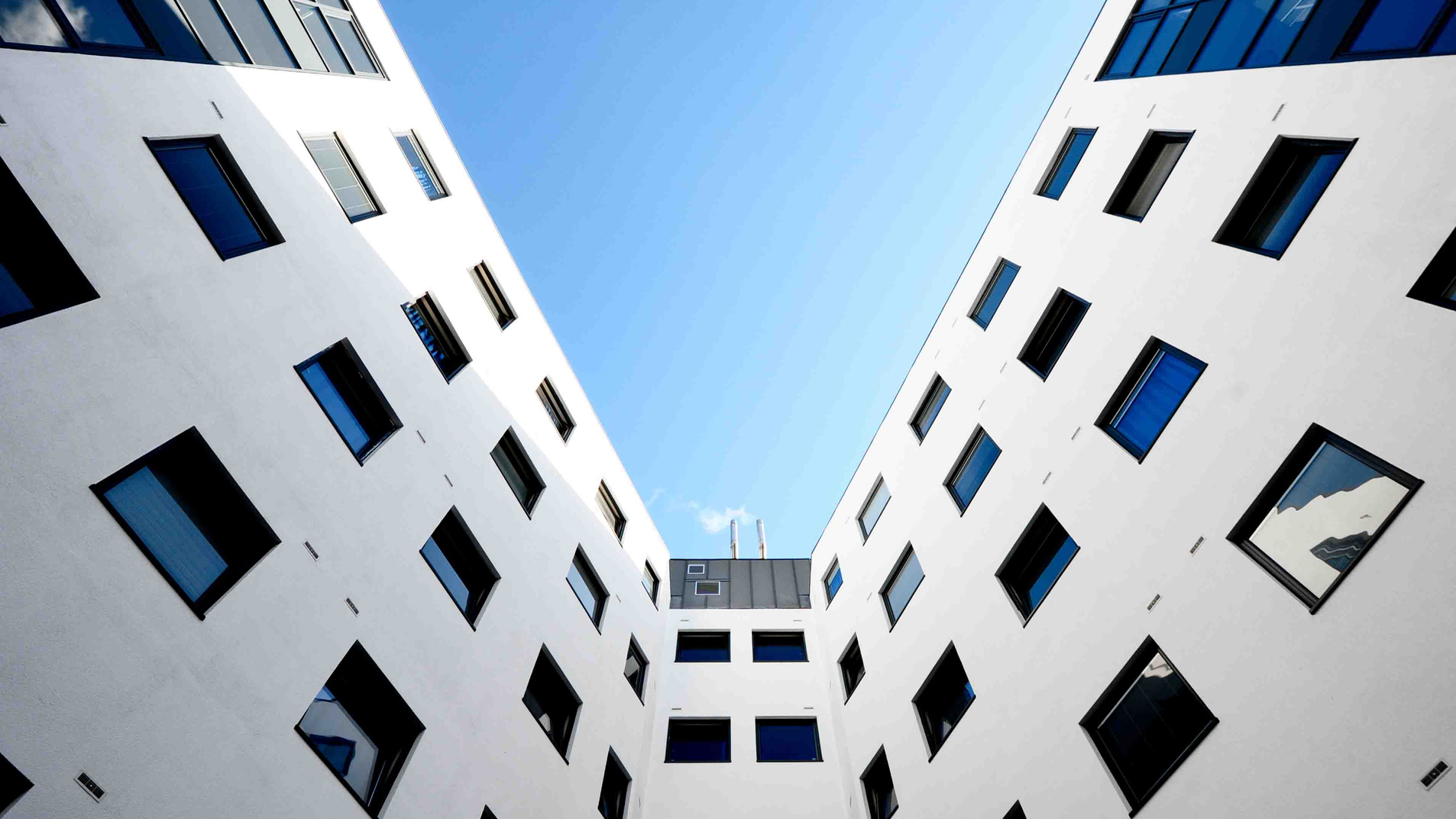 Building walls with glass windows