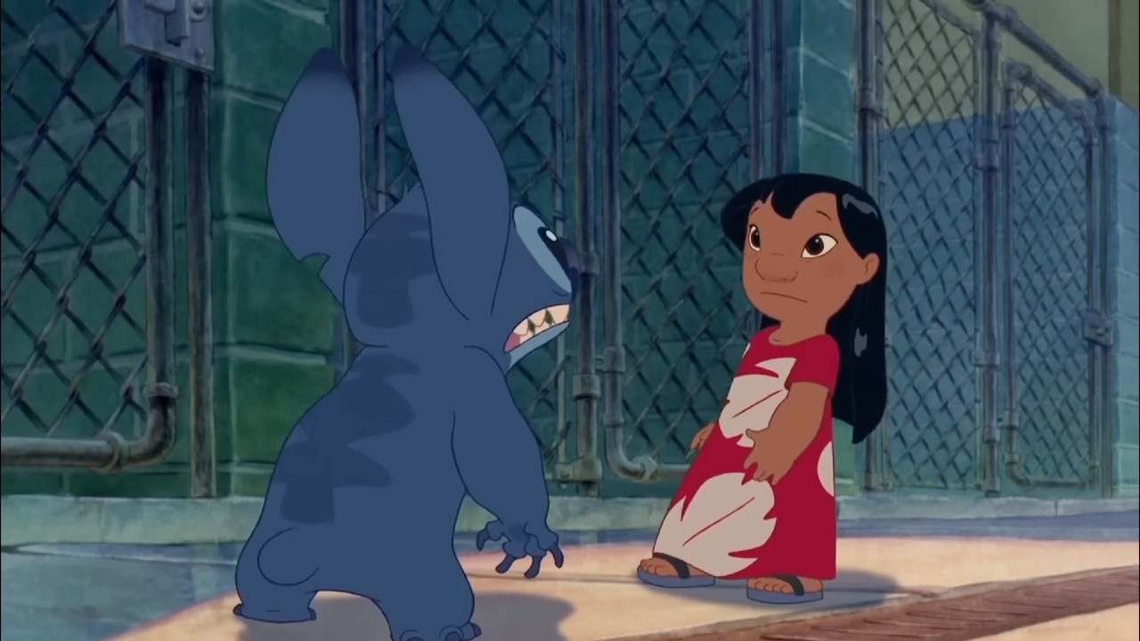 Lilo looking at Stitch in the pound in Lilo & Stitch.