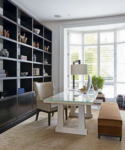 White home office with bespoke storage wall