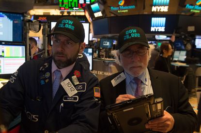 Traders sport Dow 26,000 hats