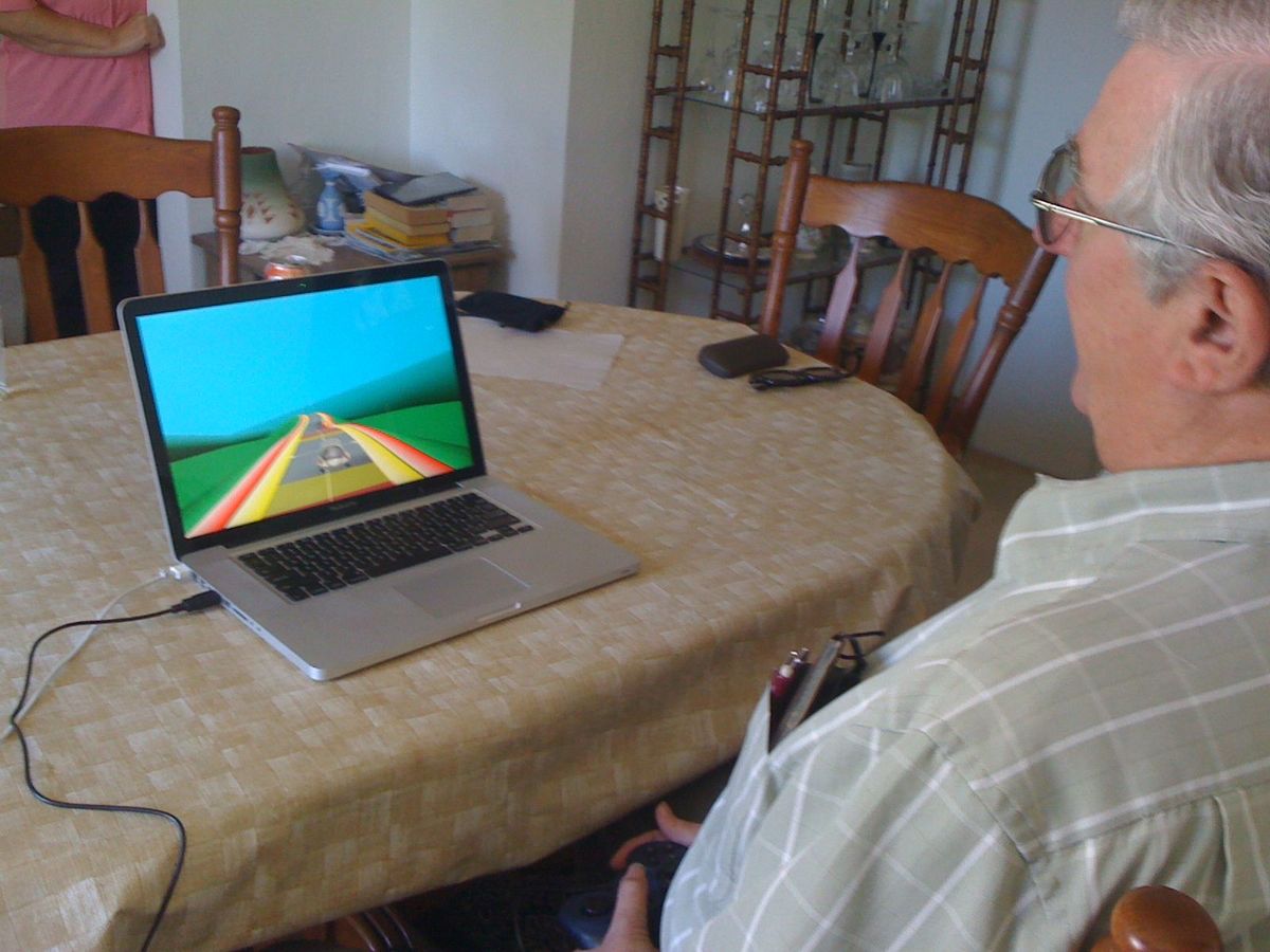 older adult playing video game