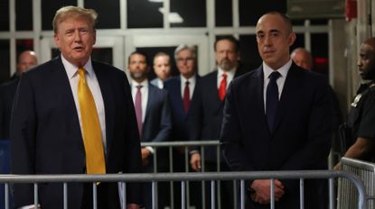 NEW YORK, NEW YORK - MAY 21: Former U.S. President Donald Trump speaks alongside his attorney Emil Bove after a break during his hush money trial at Manhattan Criminal Court on May 21, 2024 in New York City. The defense has rested their case in former President Trump's hush money trial in which he declined to testify in. Judge Juan Merchan says to expect summations and closing arguments in the criminal trial next week. Former U.S. President Trump faces 34 felony counts of falsifying business records in the first of his criminal cases to go to trial. 