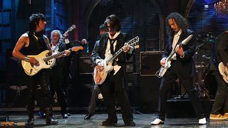 Jeff Beck, Jimmie Page, Ron Wood, Joe Perry, Kirk Hammett, Flea and Lars Ulrich perform onstage during the 24th Annual Rock and Roll Hall of Fame Induction Ceremony at Public Hall on April 4, 2009 in Cleveland, Ohio. (Photo by Stephen Lovekin/Getty Images)