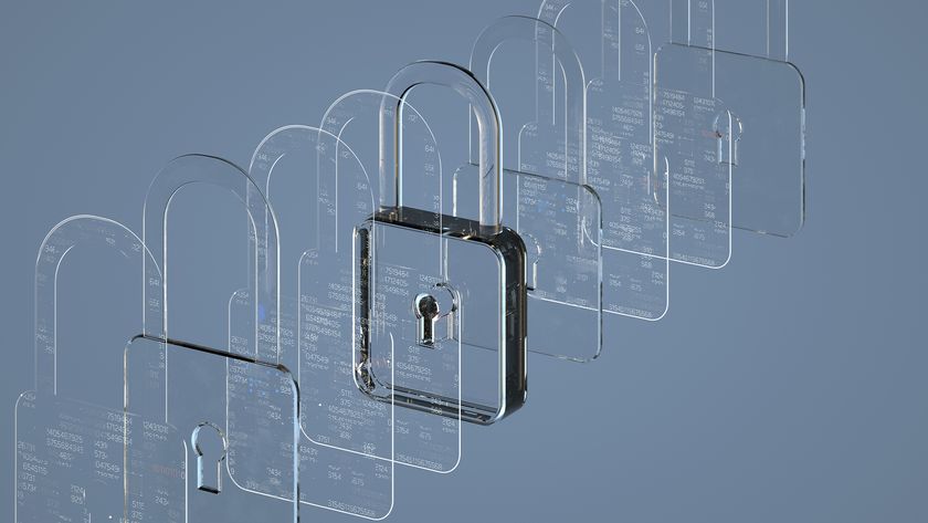 IoT security concept image showing illuminated digitized padlock lined up with transparent padlocks.