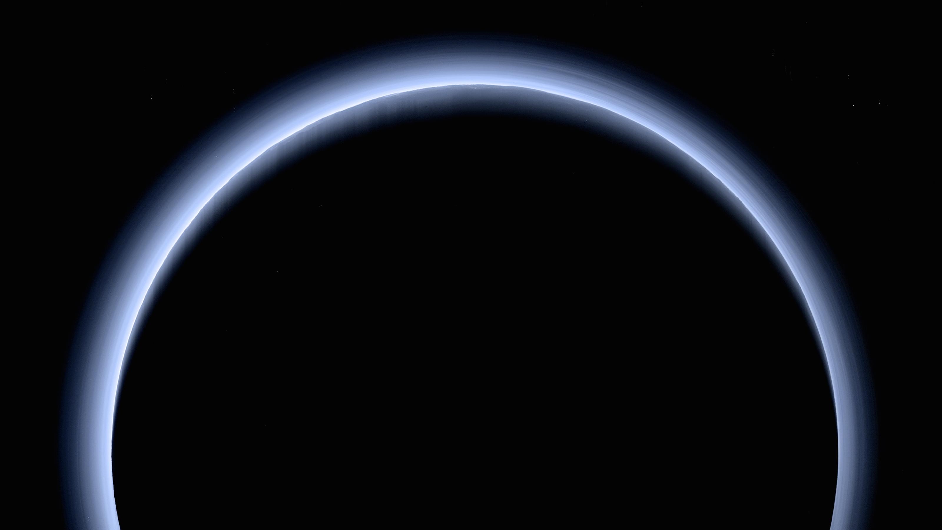 high-resolution image of Pluto as New Horizons bids the dwarf planet farewell