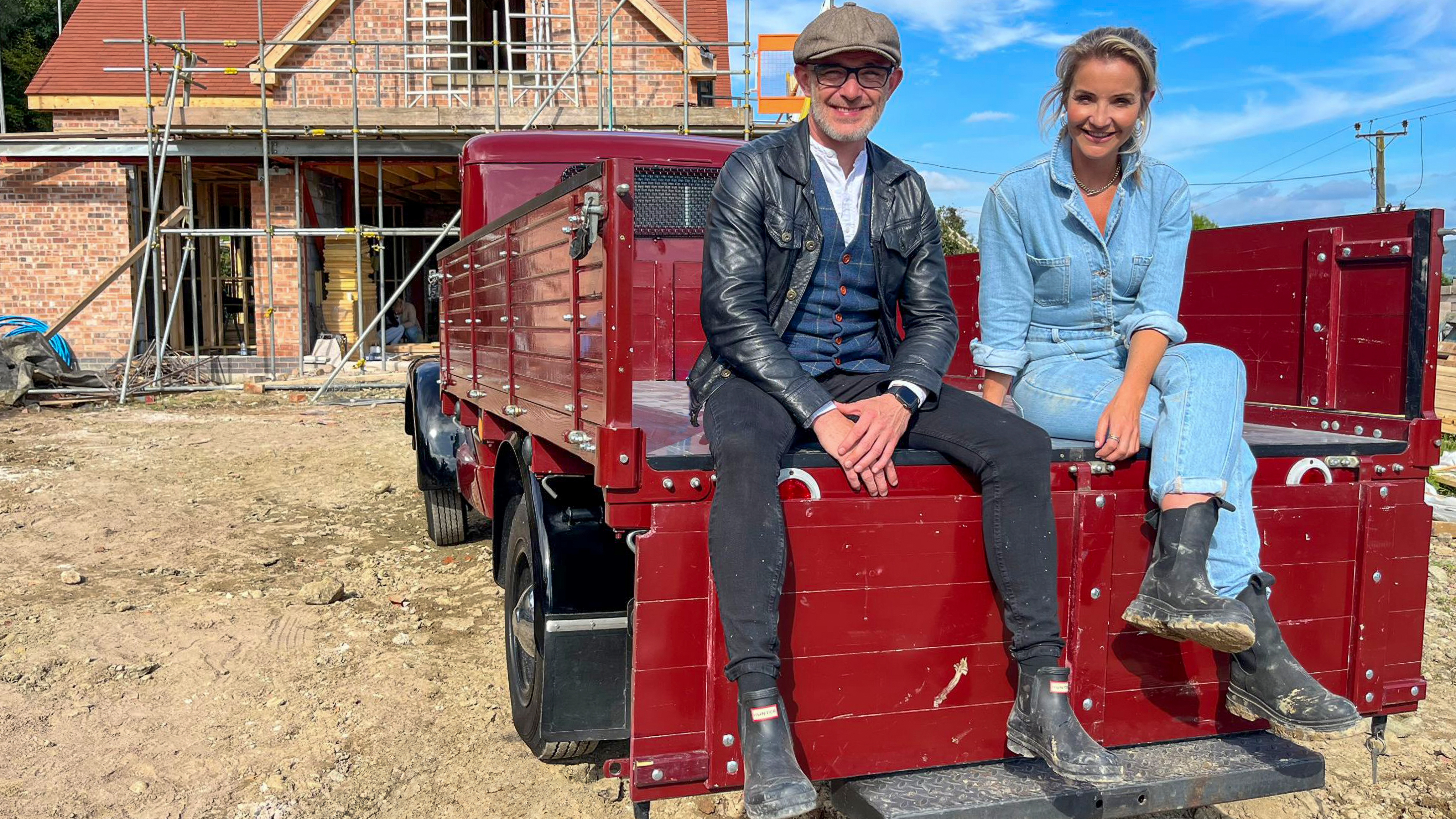 Patrick Bradley and Helen Skelton sitting on a truck in the BBC series Forever Home