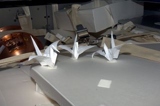Three paper origami cranes were packed aboard the Japanese cargo ship Kounotori 2 (HTV-2).