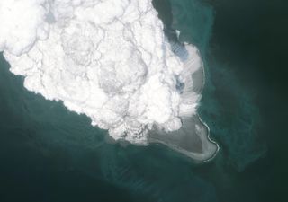 A satellite image of the Bogoslof Volcano shows volcanic clouds after a 2017 eruption.