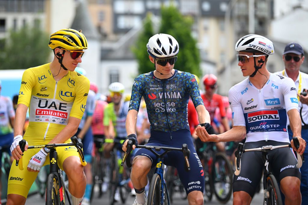 AURILLAC FRANCE JULY 11 LR Tadej Pogacar of Slovenia and UAE Team Emirates Yellow Leader Jersey Jonas Vingegaard Hansen of Denmark and Team Visma Lease a Bike and Remco Evenepoel of Belgium and Team Soudal QuickStep White Best Young Rider Jersey prior to the 111th Tour de France 2024 Stage 12 a 2036km stage from Aurillac to VilleneuvesurLot UCIWT on July 11 2024 in Aurillac France Photo by Dario BelingheriGetty Images
