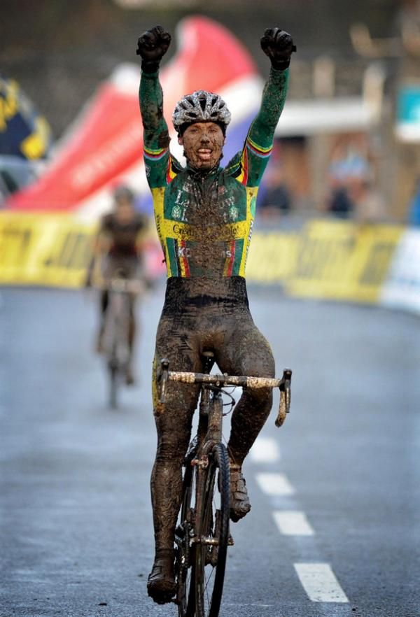 Sven Nys raises his arms aloft as he takes the world cup win in Namur.