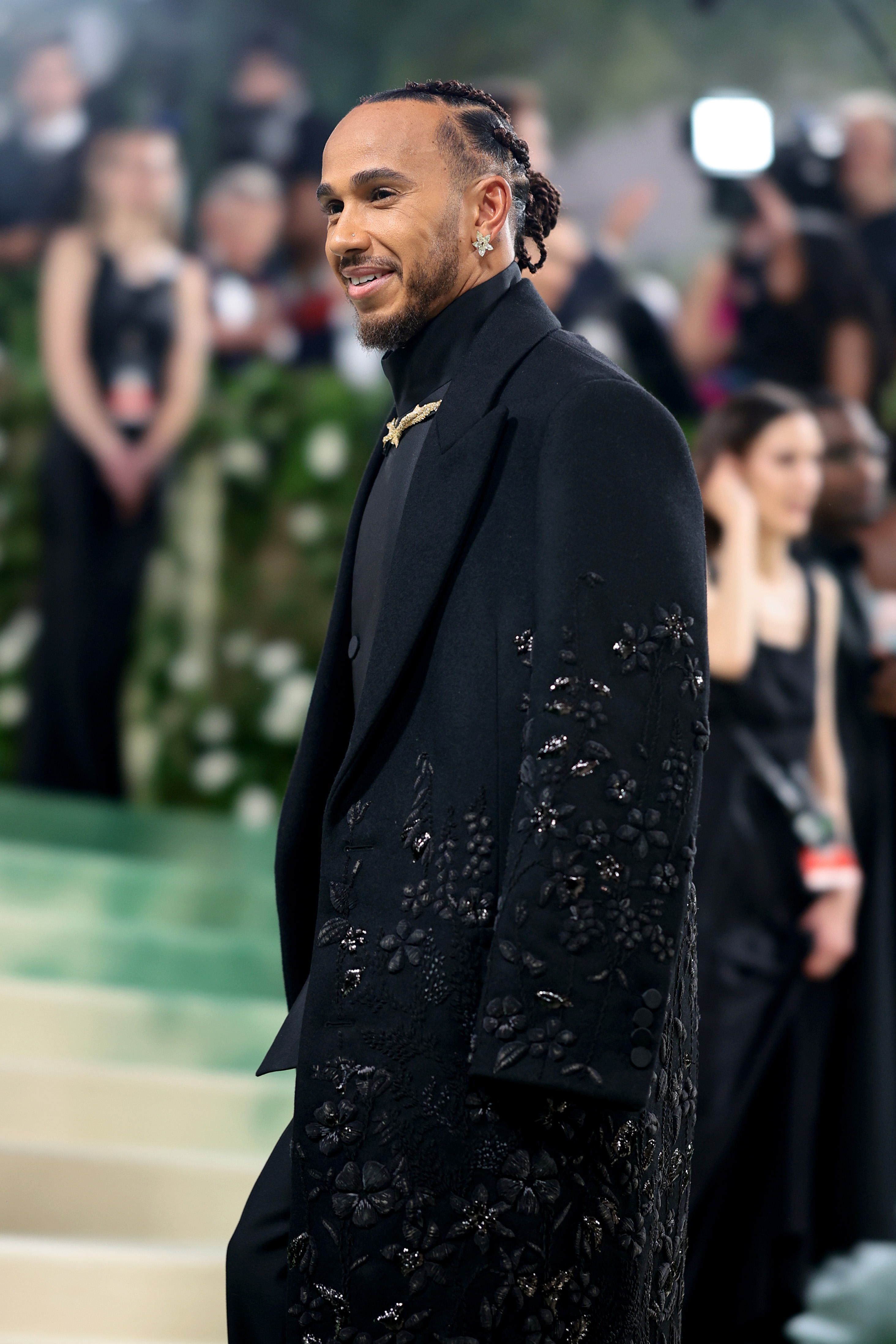 Lewis Hamilton wearing a black beaded Burberry suit at the Met Gala.