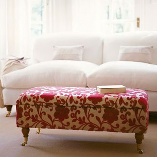 white sofa with cushions