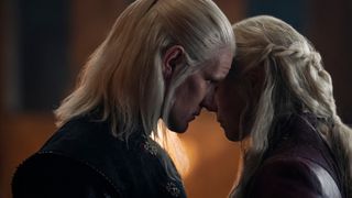 a blond man (Matt Smith as Daemon Targaryen) leans in close to a blonde woman (Emma D'Arcy as Rhaenyra Targaryen), in a still from 'House of the Dragon' season 2